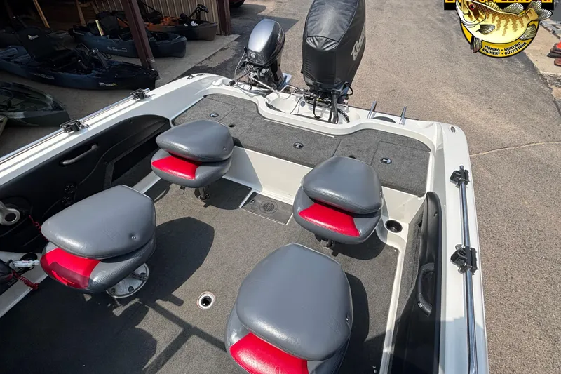 Slide: The Image of 2007 Ranger 1760 Angler boat interior with four gray and red seats. - 7