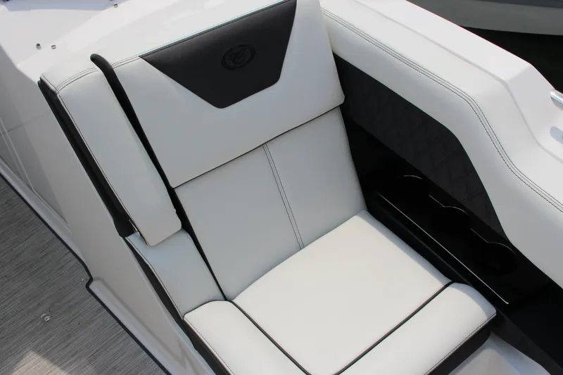 Slide: The Image of Luxurious seating in the 2025 Cobalt R31 Surf boat, featuring sleek white and black upholstery. - 28