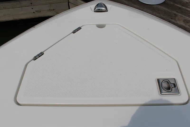 Slide: The Image of Bow storage hatch on 2025 Cobalt R31 Surf boat, featuring sleek design and durable materials. - 33