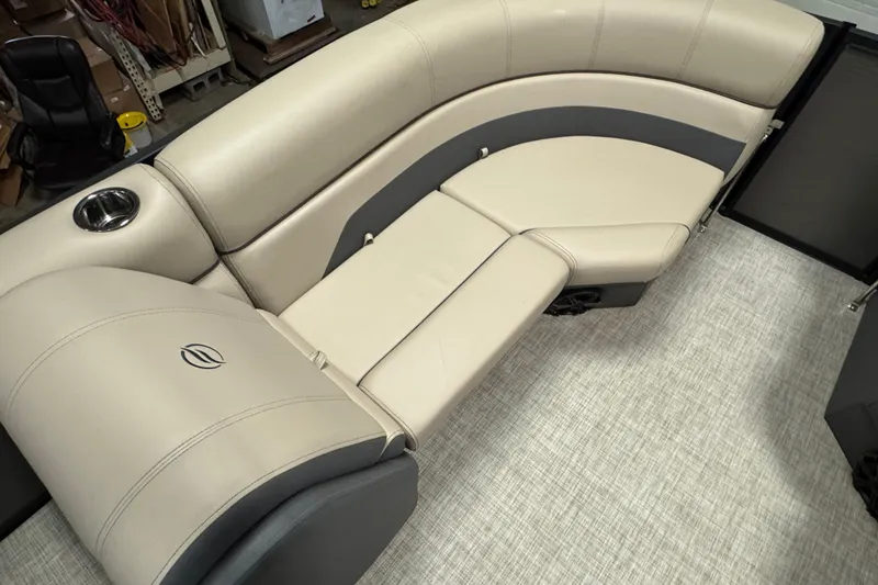 Slide: The Image of Luxurious beige seating in a 2025 Flagship F22CU boat interior. - 13