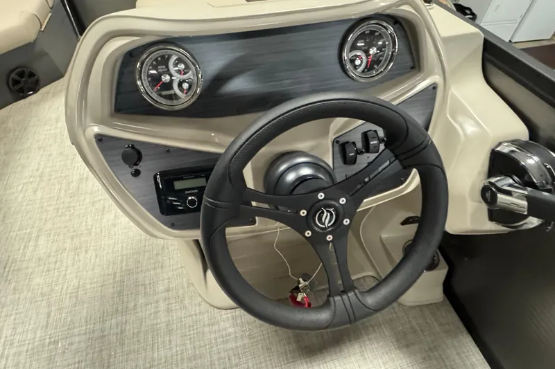 Slide: The Image of Steering console of 2025 Flagship F22CU boat with gauges and controls. - 15