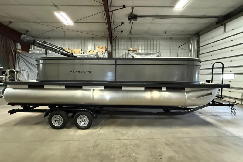 Slide: The Image of 2025 Flagship F22CU pontoon boat in a warehouse setting. - 3