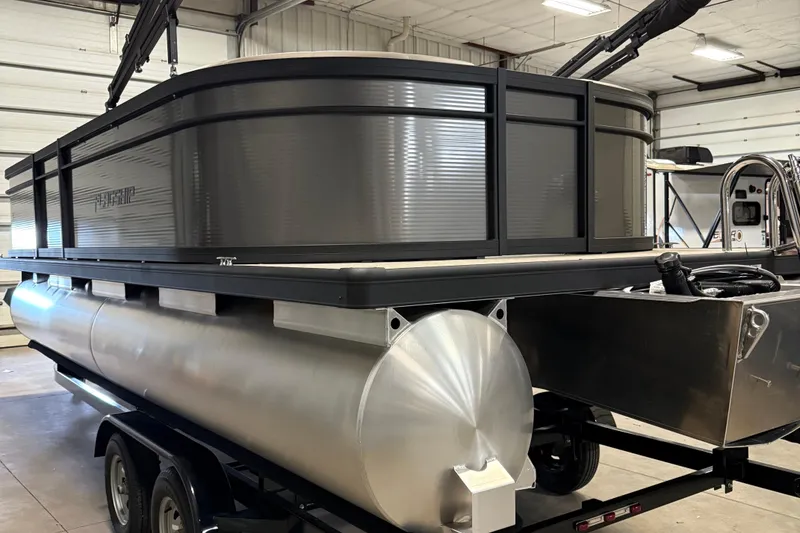 Slide: The Image of 2025 Flagship F22CU pontoon boat with Mercury Pro XS engine in a warehouse. - 5