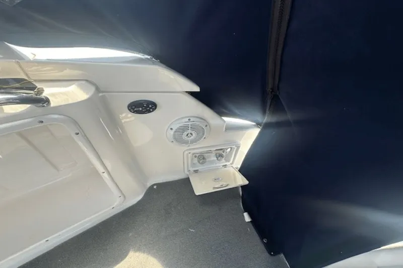 Slide: The Image of 2008 Regal 2860 Window Express boat interior with speaker and control panel. - 11