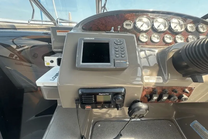 Slide: The Image of 2008 Regal 2860 Window Express dashboard with navigation and control instruments. - 19