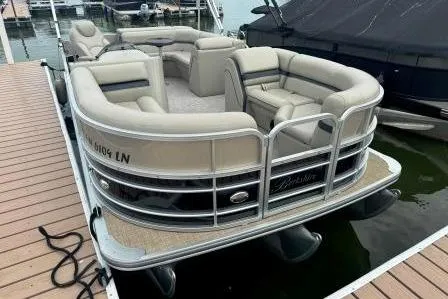 Slide: The Image of 2017 Berkshire 22CL CTS pontoon boat docked at marina. - 17