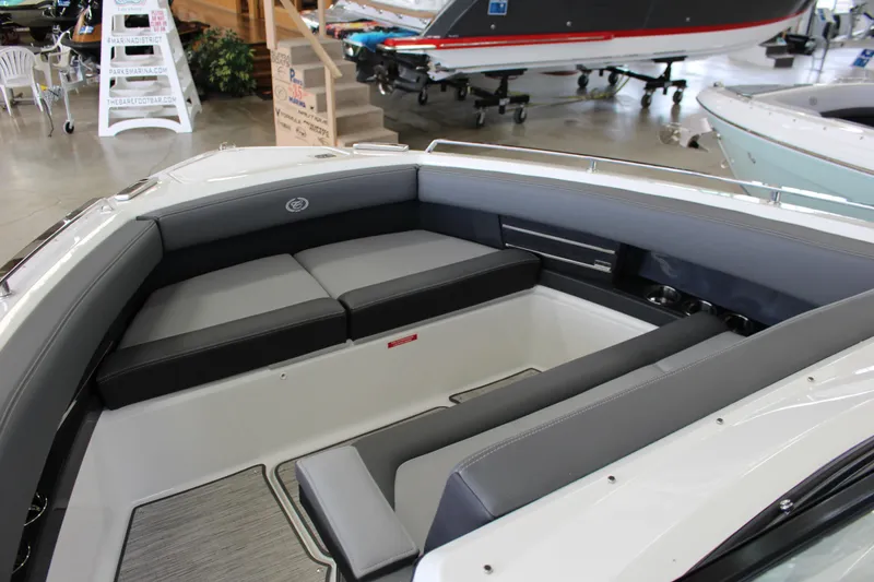 Slide: The Image of 2025 Cobalt A29 boat interior with sleek gray seating and modern design. - 4