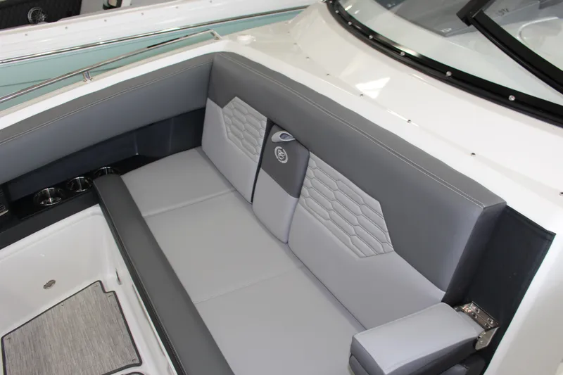 Slide: The Image of 2025 Cobalt A29 boat interior with sleek gray seating and modern design. - 5