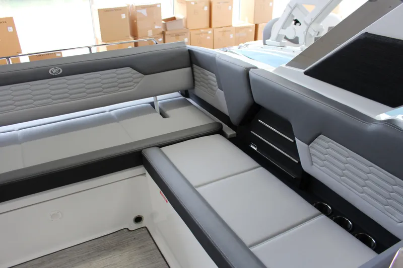 Slide: The Image of 2025 Cobalt A29 boat interior with sleek gray seating and modern design. - 6