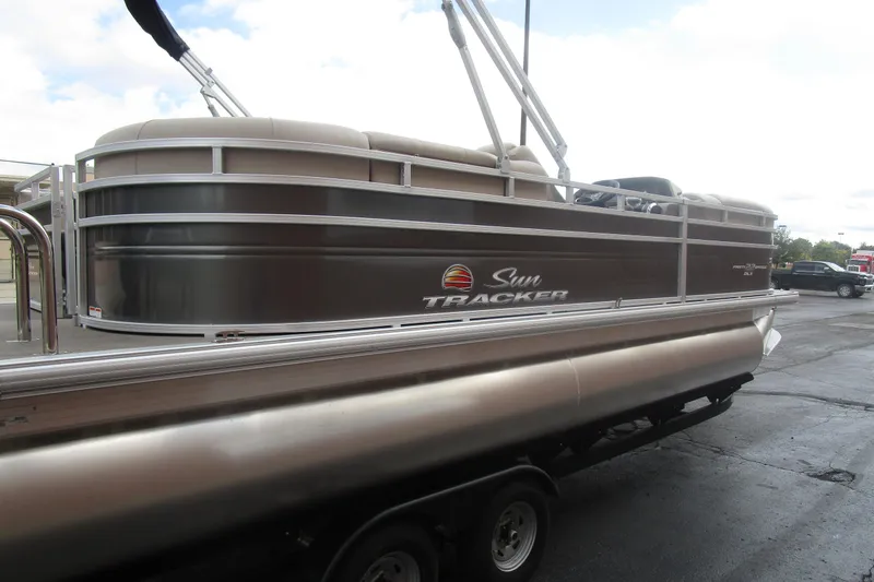 Slide: The Image of 2025 Sun Tracker PB 22 RF pontoon boat on trailer, side view. - 5