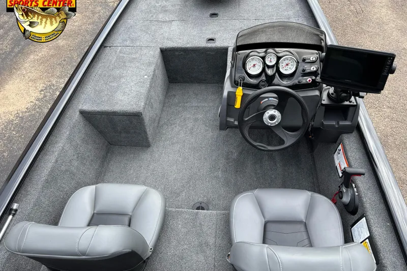 Slide: The Image of 2023 Tracker Pro 170 boat interior with steering console and seating. - 5
