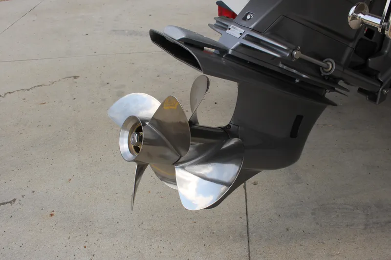 Slide: The Image of 2025 Cobalt CS23 boat propeller on concrete surface. - 13