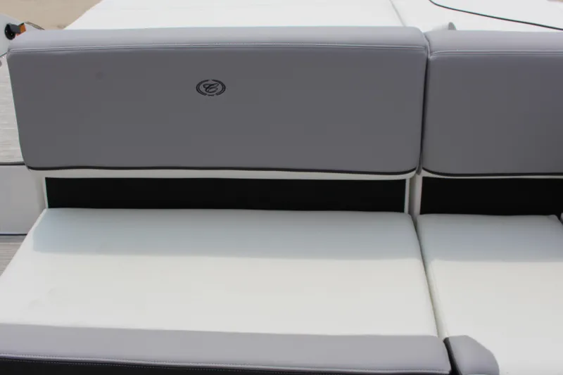 Slide: The Image of 2025 Cobalt CS23 boat seat with gray and white upholstery. - 26