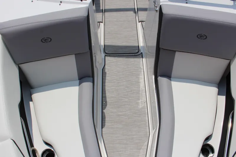 Slide: The Image of 2025 Cobalt CS23 boat interior with gray seating and modern design. - 41