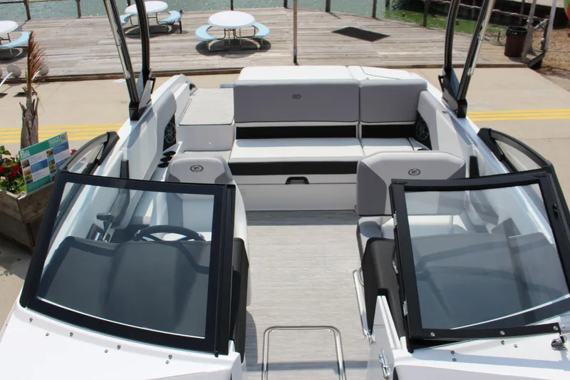 Slide: The Image of 2025 Cobalt CS23 boat interior with sleek seating and modern design. - 42