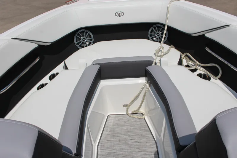 Slide: The Image of 2025 Cobalt CS23 boat interior with sleek seating and modern design elements. - 46