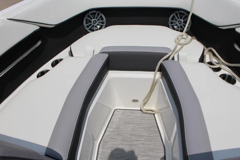 Slide: The Image of 2025 Cobalt CS23 boat interior with sleek seating and modern design elements. - 5