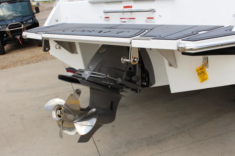 Slide: The Image of 2025 Cobalt CS23 boat stern with propeller and swim platform. - 9