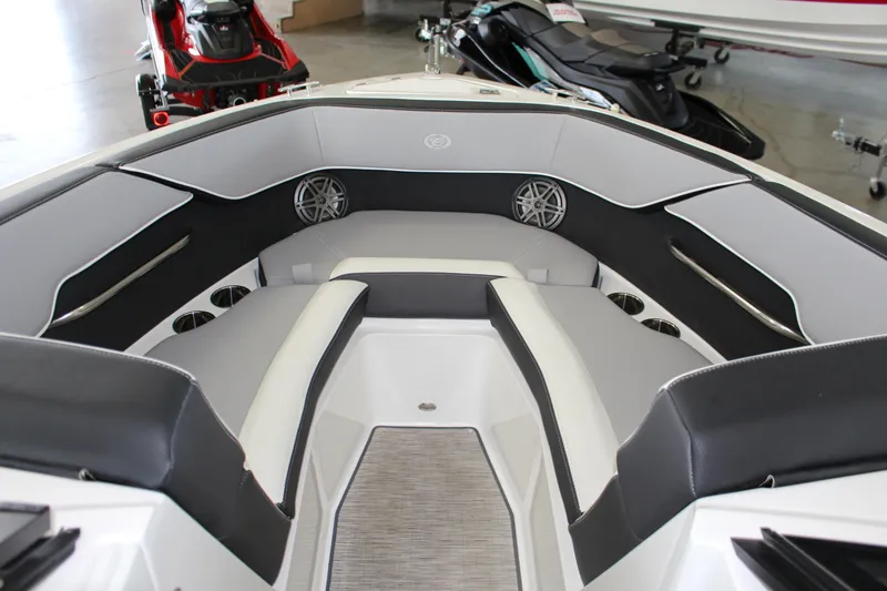 Slide: The Image of 2025 Cobalt CS23 Surf boat interior with sleek seating and modern design. - 9