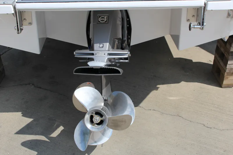 Slide: The Image of 2025 Cobalt CS23 boat propeller and stern view on concrete surface. - 38