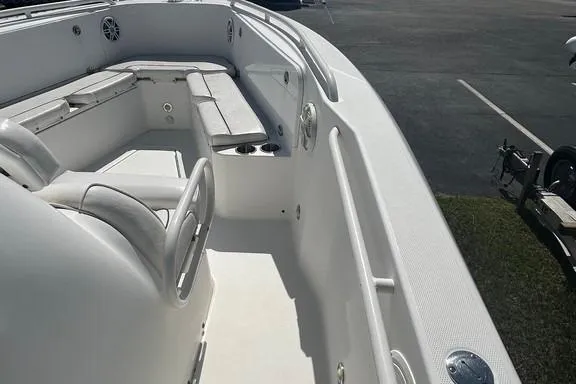 Slide: The Image of 2008 Everglades 290 CC boat interior with seating and cup holders. - 30