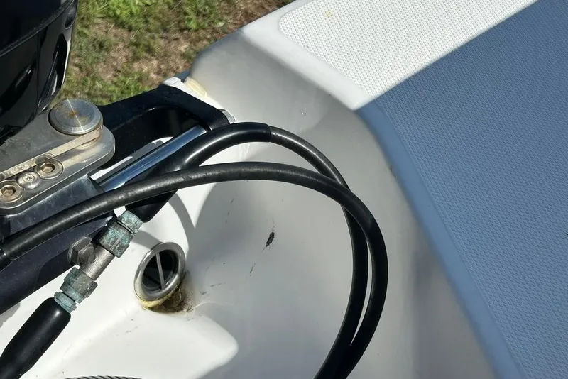 Slide: The Image of Close-up of 2008 Everglades 290 CC boat's engine cables and deck detail. - 39