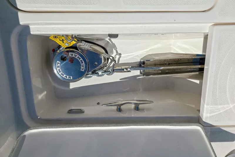 Slide: The Image of Anchor compartment of 2026 Regal 38 Grande Coupe with Lewmar windlass. - 21