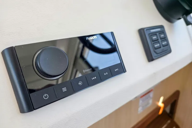 Slide: The Image of Control panel on 2026 Regal 38 Grande Coupe, featuring Bluetooth audio system. - 35