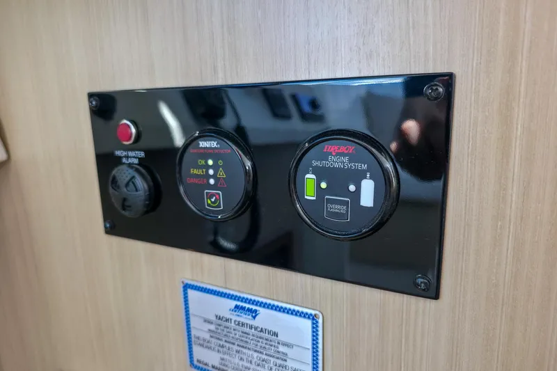 Slide: The Image of Control panel on 2026 Regal 38 Grande Coupe with high water alarm and engine shutdown system. - 37