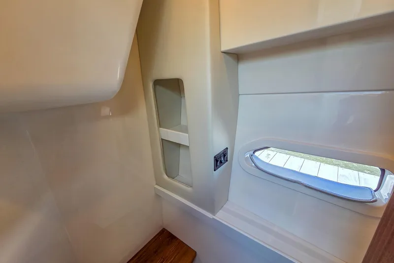 Slide: The Image of Interior of 2026 Regal 38 Grande Coupe, featuring sleek design and window view. - 52