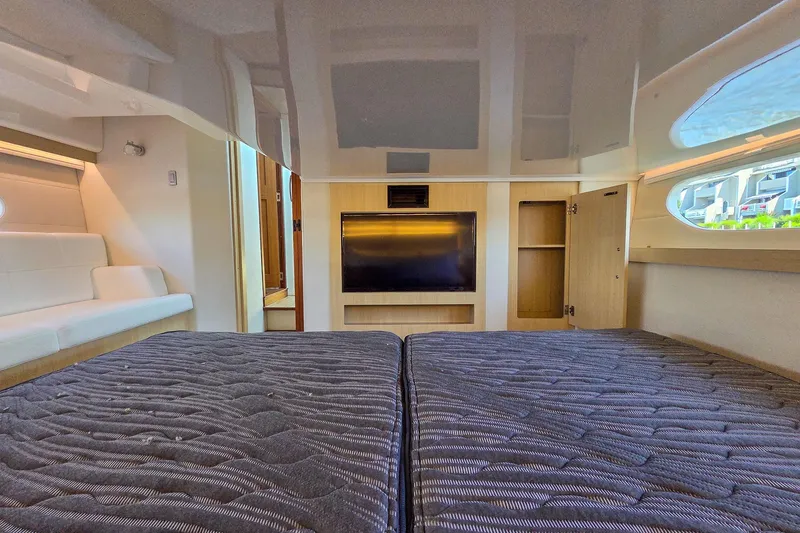 Slide: The Image of Interior of 2026 Regal 38 Grande Coupe with modern furnishings and large window. - 54