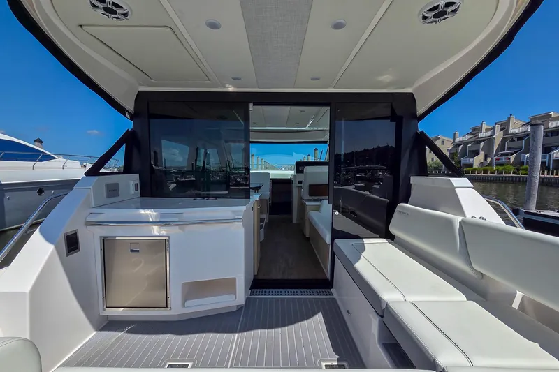 Slide: The Image of 2026 Regal 38 Grande Coupe yacht interior with sleek design and modern amenities. - 7