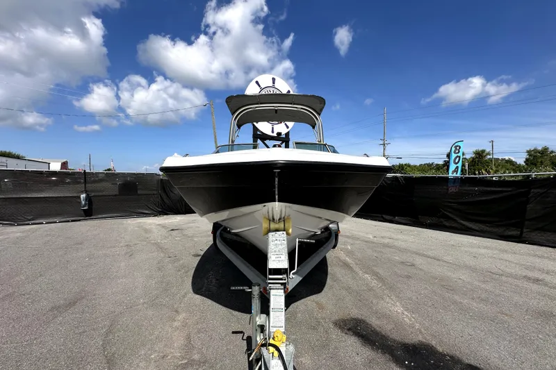 Slide: The Image of 2016 Yamaha Boats AR190 on trailer under blue sky. - 1