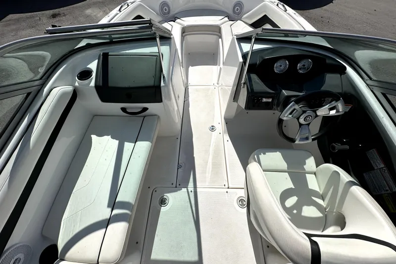 Slide: The Image of 2016 Yamaha Boats AR190 interior with steering wheel, seating, and dashboard. - 17