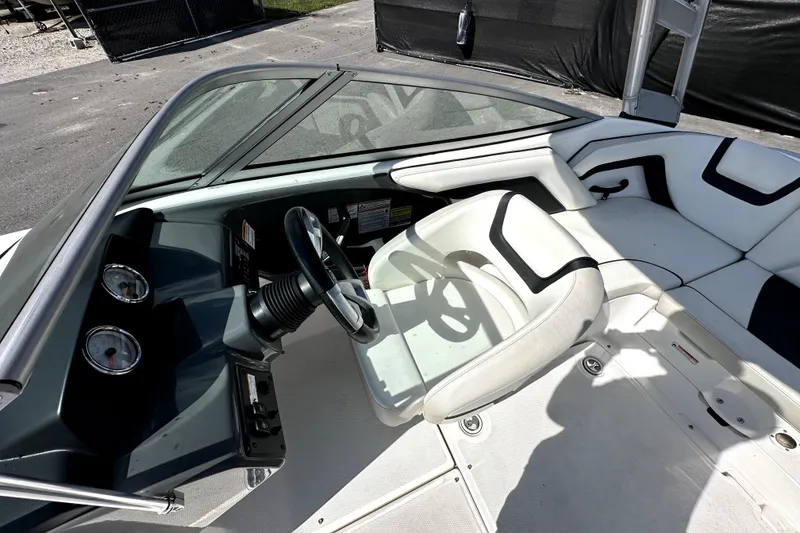 Slide: The Image of 2016 Yamaha Boats AR190 interior with steering wheel and seating area. - 20