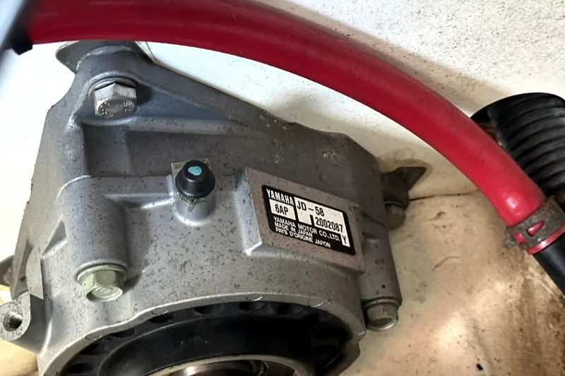 Slide: The Image of 2016 Yamaha AR190 engine component with red hose and label details. - 43