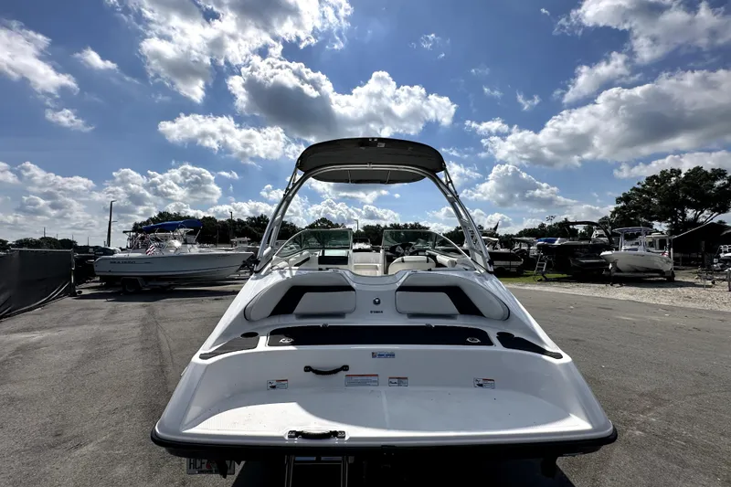 Slide: The Image of 2016 Yamaha Boats AR190 on display under a bright, cloudy sky. - 5