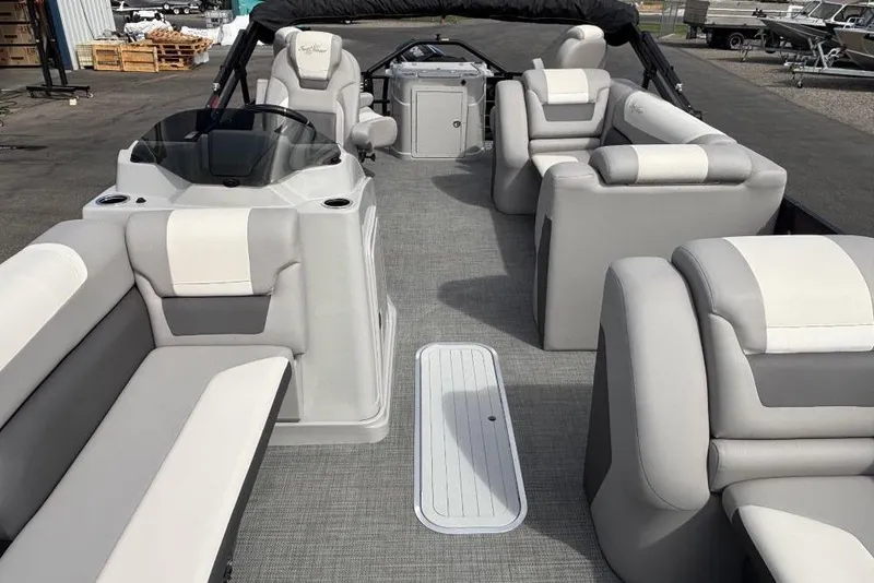 Slide: The Image of 2025 SunChaser Eclipse 23 Fish pontoon boat interior with plush seating and modern design. - 8