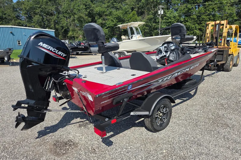 Slide: The Image of 2022 Tracker Pro Team 175 TXW boat with Mercury engine on a trailer. - 3