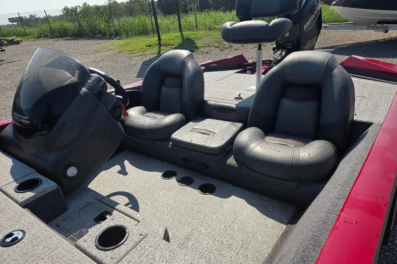 Slide: The Image of 2022 Tracker Pro Team 175 TXW boat interior with wet seats and steering console. - 7