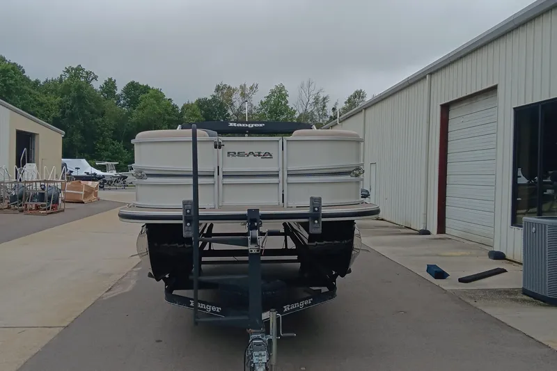 Slide: The Image of 2017 Ranger Reata 220C boat on trailer outside storage facility. - 3