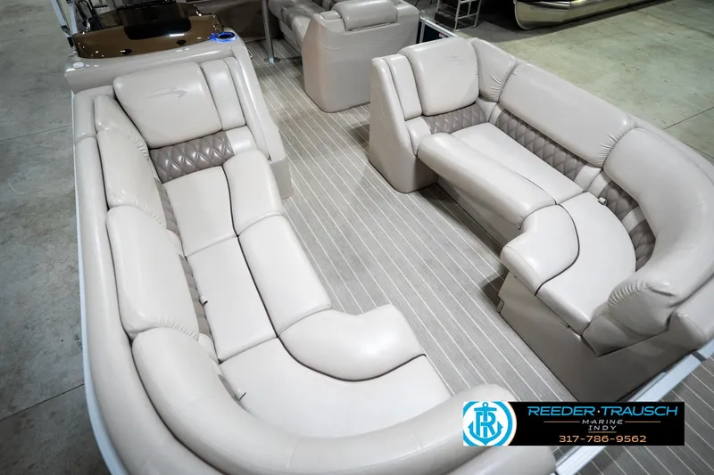 Slide: The Image of 2016 Bennington 2375 RSB pontoon boat interior with luxurious seating and modern design. - 12