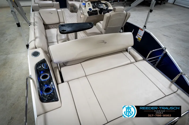 Slide: The Image of 2016 Bennington 2375 RSB pontoon boat interior with luxurious seating and modern amenities. - 14
