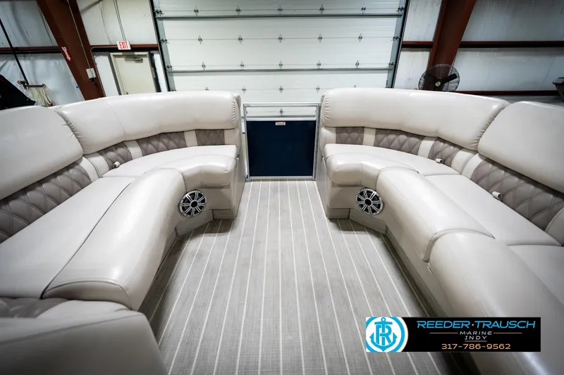 Slide: The Image of Luxurious interior of 2016 Bennington 2375 RSB pontoon boat in showroom setting. - 20