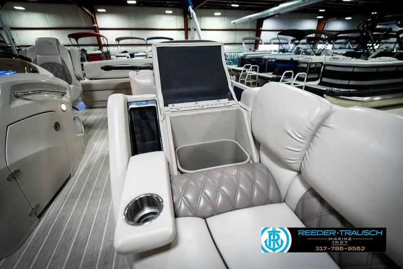 Slide: The Image of Luxurious seating on 2016 Bennington 2375 RSB pontoon boat in showroom. - 23
