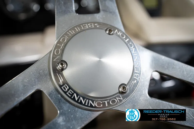 Slide: The Image of Steering console of 2016 Bennington 2375 RSB boat with gauges and controls. - 34