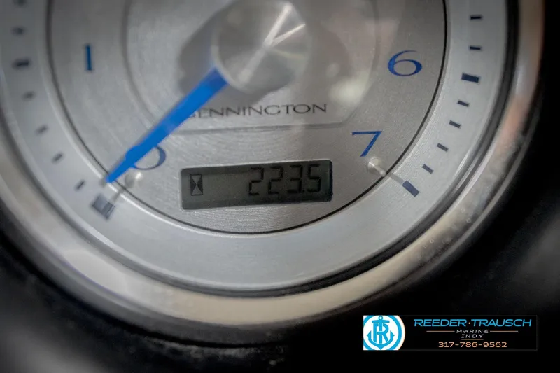 Slide: The Image of Close-up of 2016 Bennington 2375 RSB RPM gauge displaying 2235 hours. - 38