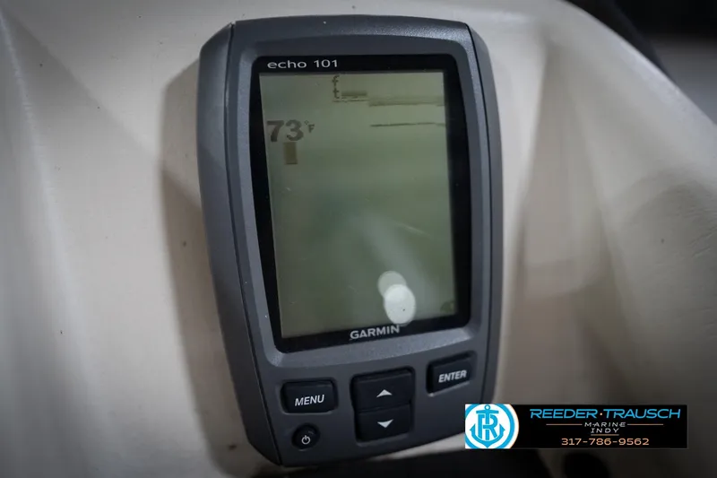 Slide: The Image of Close-up of 2016 Bennington 2375 RSB dashboard gauges with Reeder-Trausch Marine logo. - 41