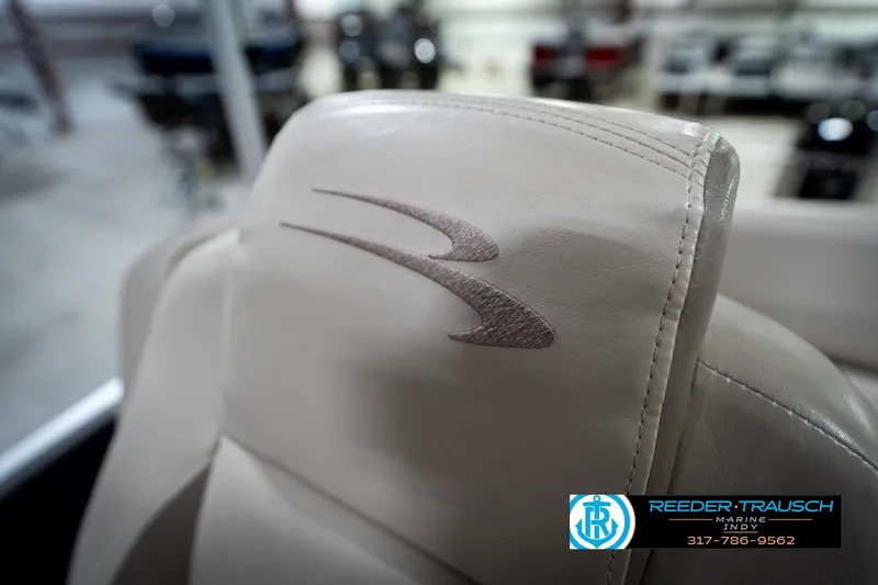 Slide: The Image of Luxurious seating on a 2016 Bennington 2375 RSB boat, showcased indoors at Reeder-Trausch Marine. - 46