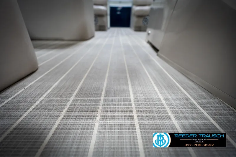 Slide: The Image of 2016 Bennington 2375 RSB interior flooring with modern design, showcased by Reeder Trausch Marine. - 55